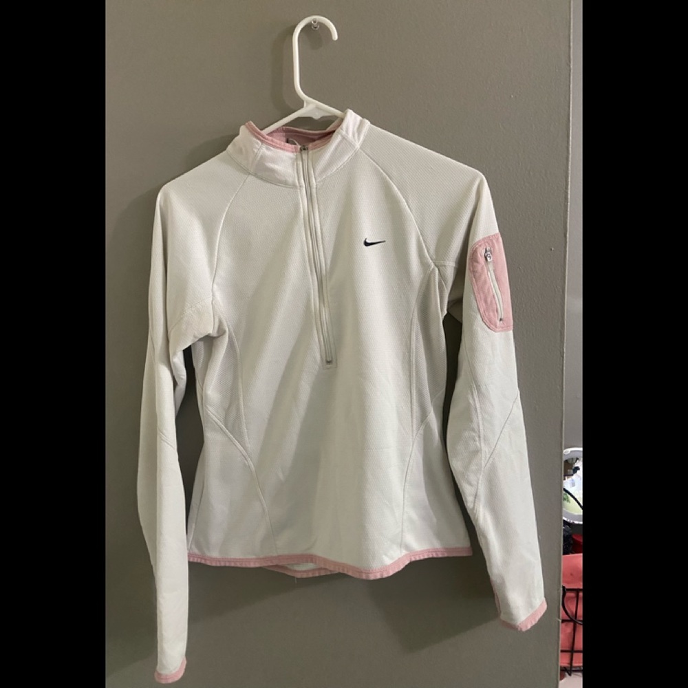 White and pink Nike zip up